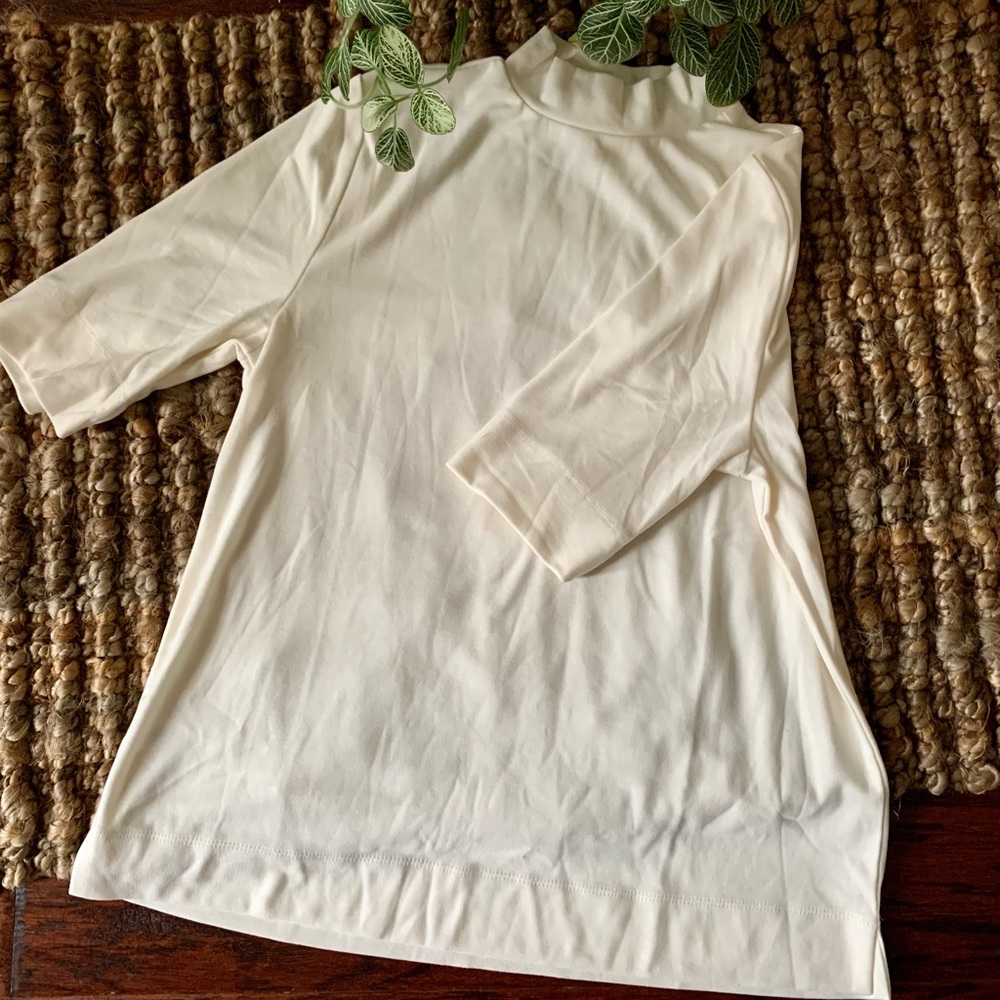 Loft Turtle Neck. Cream. Three quarter Sleeve.